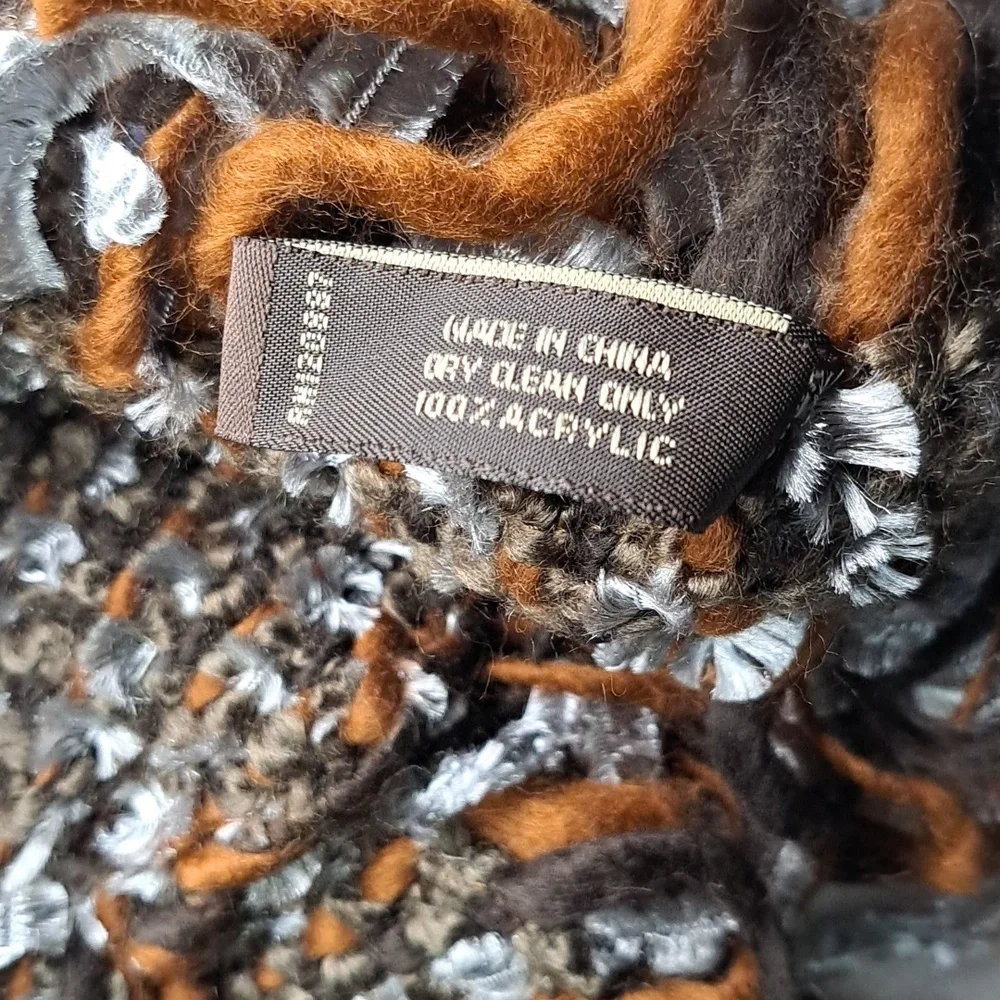 Eyeful Fringe Knit Scarf in Brown And Silver Has Faux Feather Detail